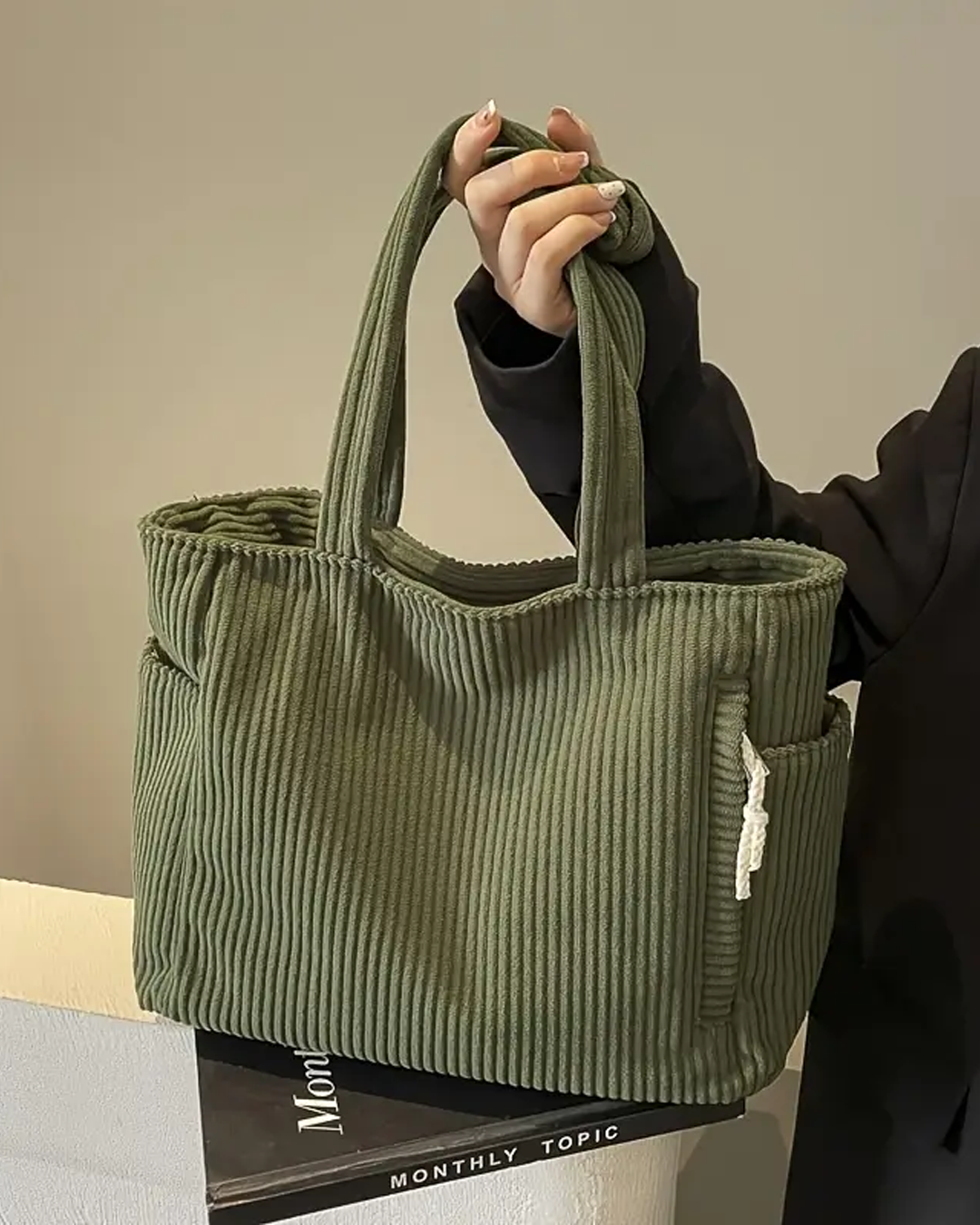 SYLVA | BORSA A MANO RIGATA CON DETTAGLI IN CORDINO