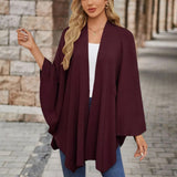 Lia™ — Poncho elegante con nodo frontale