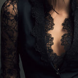 Noémie | Top blazer nero con maniche semitrasparenti