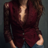 Noémie | Top blazer nero con maniche semitrasparenti
