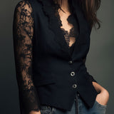 Noémie | Top blazer nero con maniche semitrasparenti