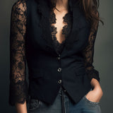 Noémie | Top blazer nero con maniche semitrasparenti