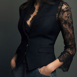 Noémie | Top blazer nero con maniche semitrasparenti