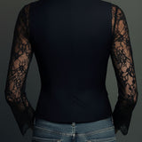 Noémie | Top blazer nero con maniche semitrasparenti