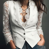 Noémie | Top blazer nero con maniche semitrasparenti