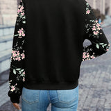 Thea™ — Giacca floreale con collo stile bomber