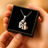 Necklace with a cat hug pendant