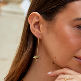 Gold rings with a delicate pendant