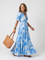 Ione | Abito Midi Floreale con Scollo a V