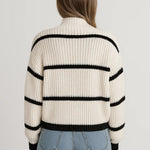 DEVINA | MAGLIONE CON COLLO ALTO A RIGHE RIBBATO