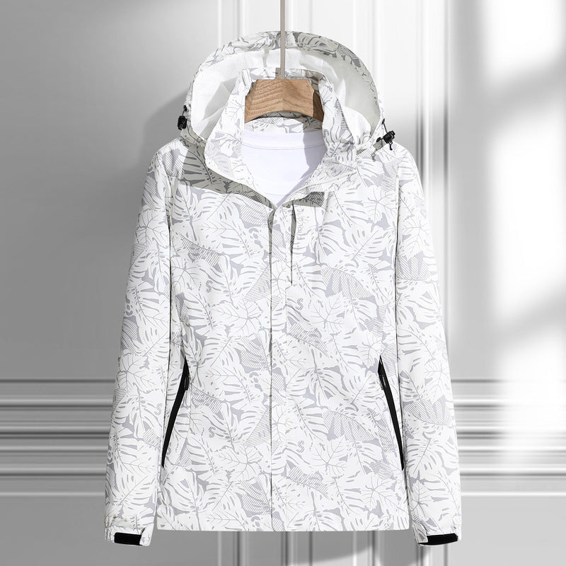 Giacca leggera antivento da donna con cappuccio e fantasia di foglie