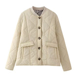 Giacca cardigan trapuntata con scollo rotondo e bottoni