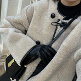 Giacca corta teddy da donna con alamari