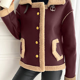 Giacca da donna in similpelle con fodera teddy e bottoni