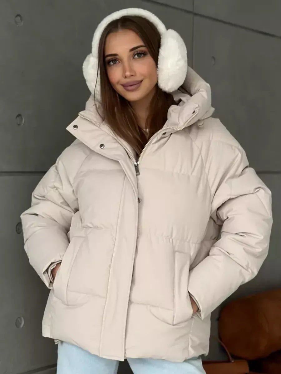 Piumino oversize da donna con cappuccio e tasche