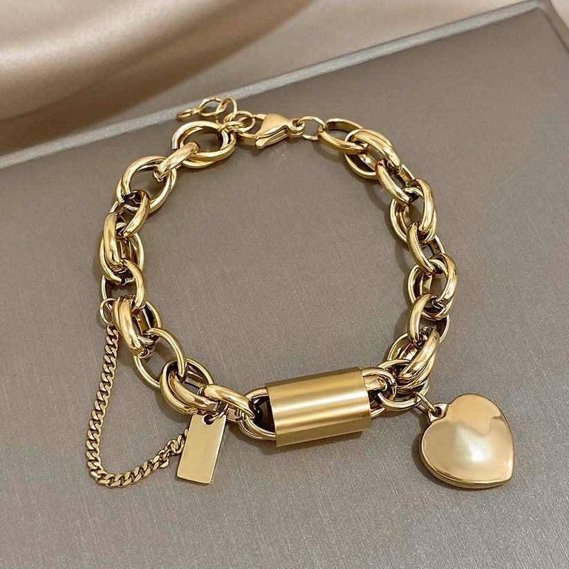 Bracciale dorato a maglie grandi con cuore