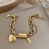 Bracciale dorato a maglie grandi con cuore
