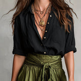 Vera | Black shirt and olive skirt