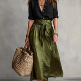 Vera | Black shirt and olive skirt