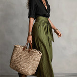 Vera | Black shirt and olive skirt
