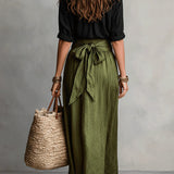 Vera | Black shirt and olive skirt