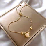 Bracciale a cuore con opale pesca placcato oro – Immagine 1