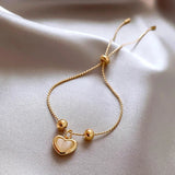 Bracciale a cuore con opale pesca placcato oro – Immagine 3