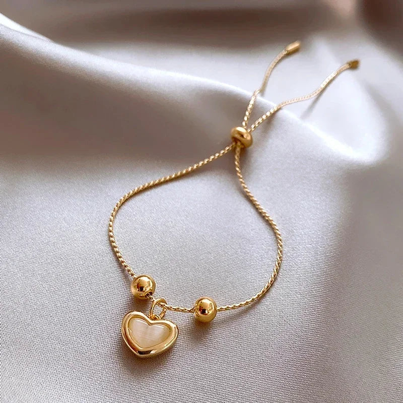 Bracciale a cuore con opale pesca placcato oro – Immagine 3