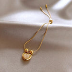 Bracciale a cuore con opale pesca placcato oro – Immagine 4