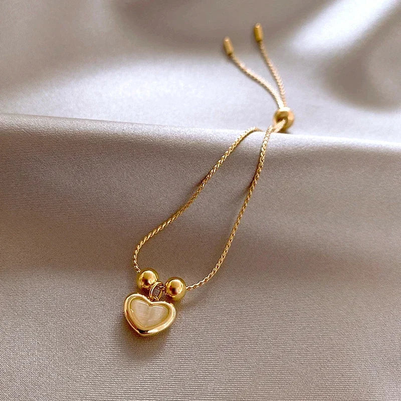 Bracciale a cuore con opale pesca placcato oro – Immagine 4