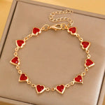Bracciale dorato con cuore rubino – Immagine 1