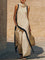Yenira | Completo in cotone e lino dal taglio artistico
