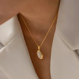 Collana dorata con opale ovale occhio di gatto – Immagine 4