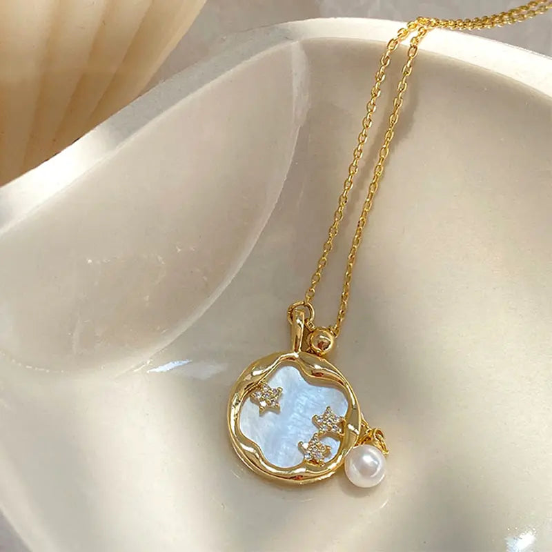 Collana dorata con pietra di luna e perla – Immagine 1