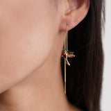 Gold rings with a delicate pendant