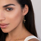 Gold rings with a delicate pendant
