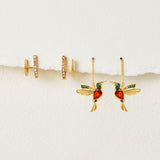Gold rings with a delicate pendant