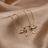 Gold rings with a delicate pendant