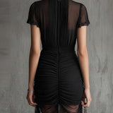 Black chiffon mini dress with pleated waist and lace trim