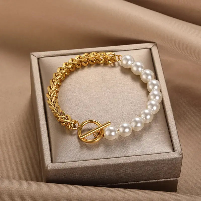 Elegante bracciale dorato con perle – Immagine 1