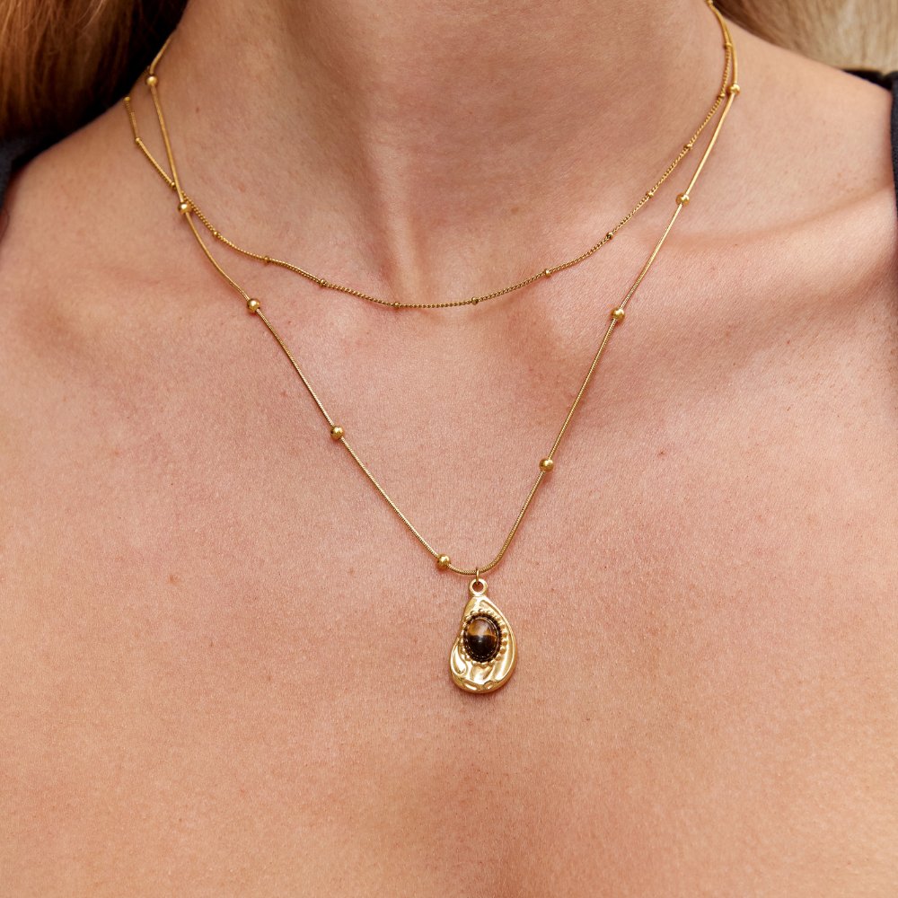 Elegante collana dorata con occhio di tigre – Immagine 2