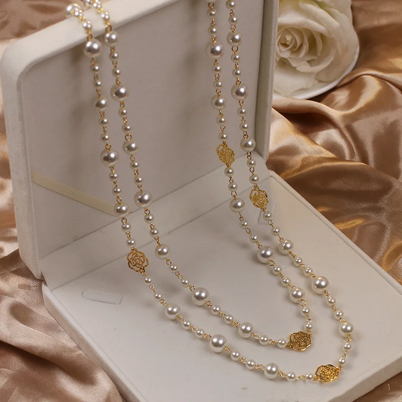 Elegante collana dorata con perle – Immagine 1