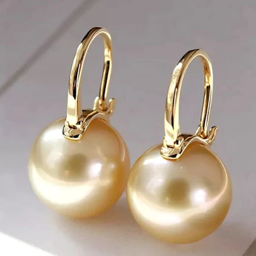 Eleganti orecchini dorati con perle – Immagine 1