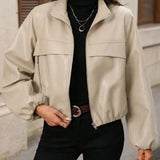 Giacca corta da donna in similpelle con tasche con zip