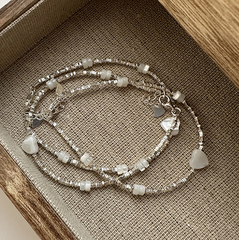 Set di bracciali con perle vintage