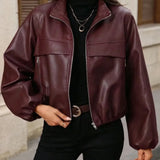 Giacca corta da donna in similpelle con tasche con zip