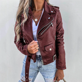 Giacca da donna con cintura e tasche con zip