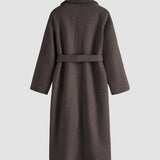 Cappotto lungo elegante da donna con cintura e revers
