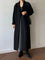 Cappotto lungo elegante da donna con cintura e revers