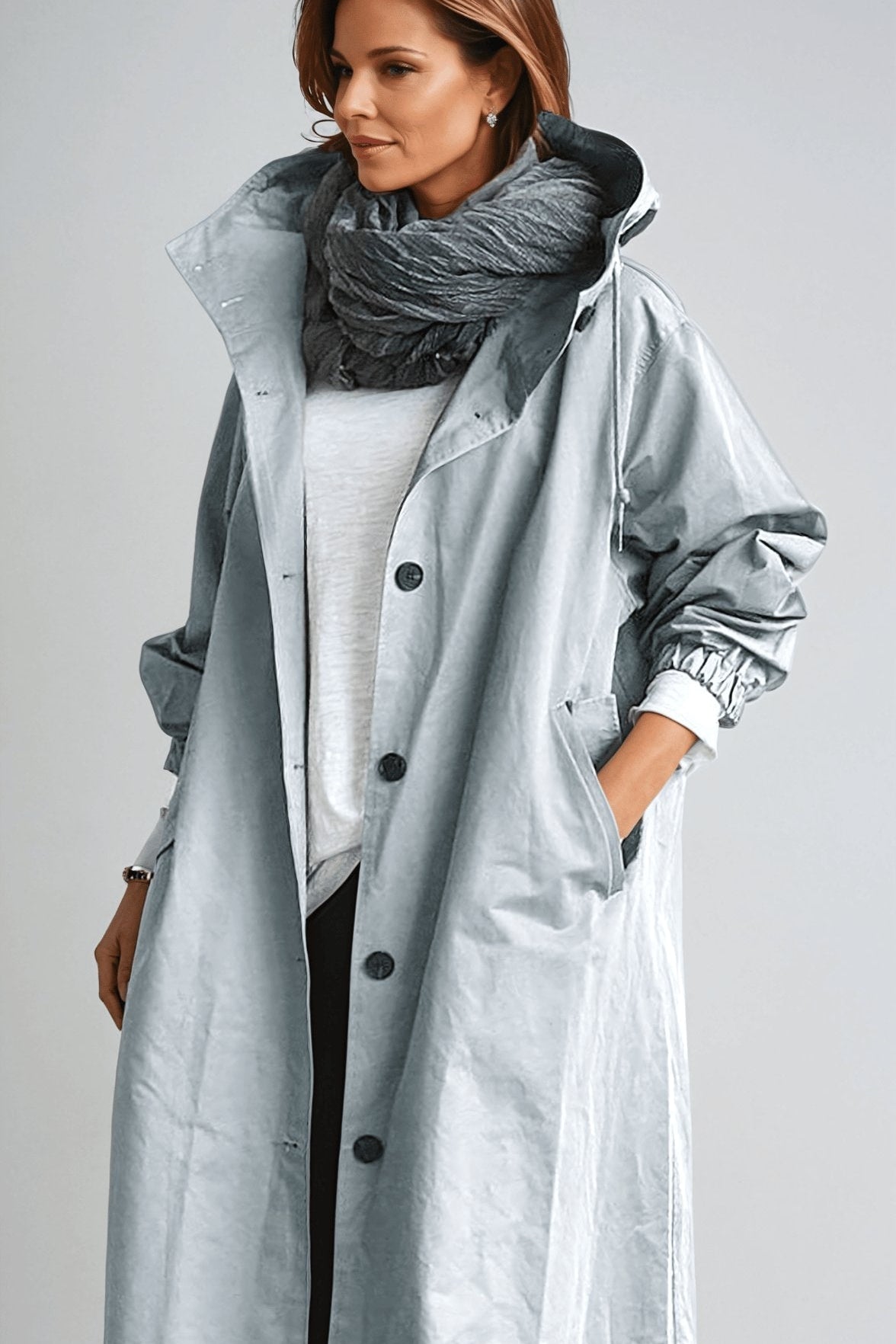 Cappotto lungo da donna con cappuccio e bottoni classici